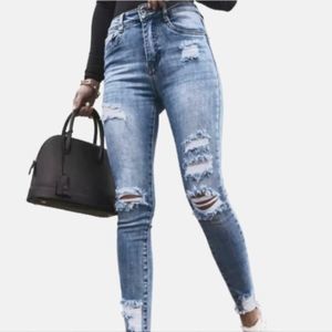 Light Wash Destructed Skinny Jeans